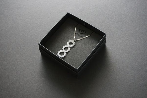 Infinite 3 | Necklace with a bobbin lace pendant